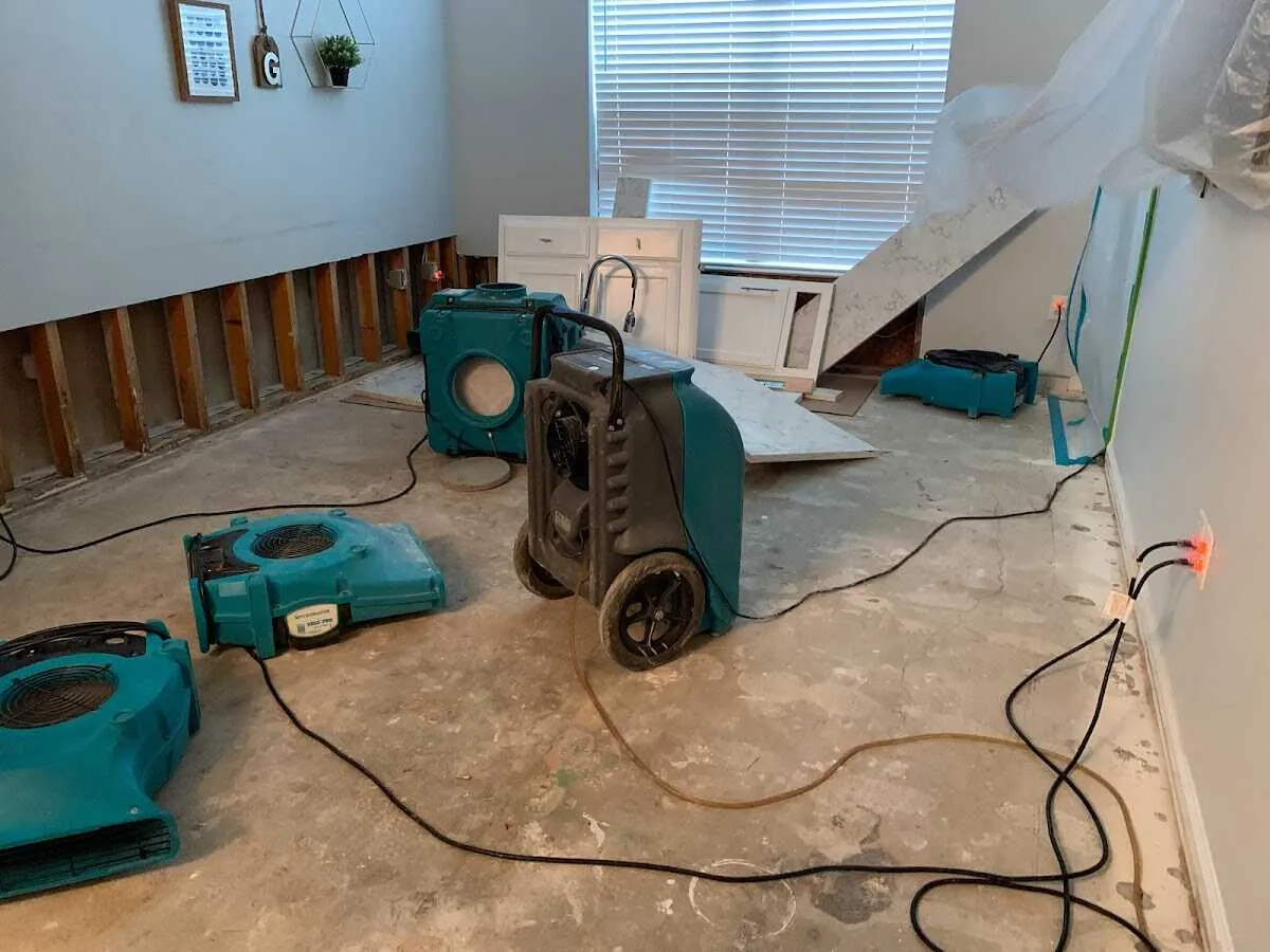Dehumidifier in flood-cut room for Water Damage Restoration in Kenner